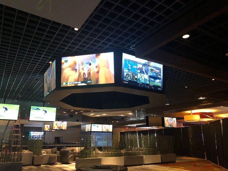 mounted tvs in gaming room
